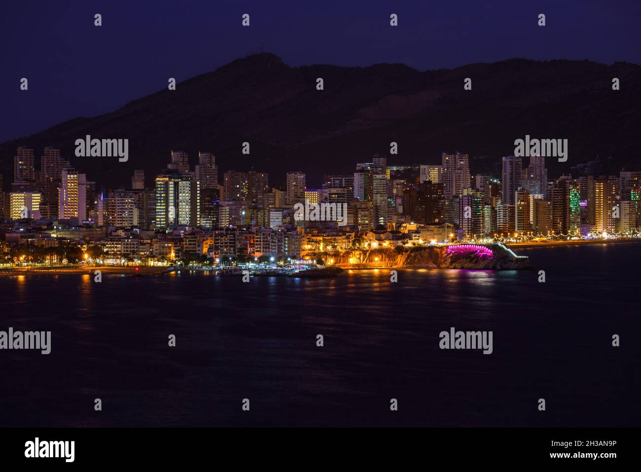 Night view of Benidorm cityscape famous vacations city in Spain Mediterranean coast. Stock Photo