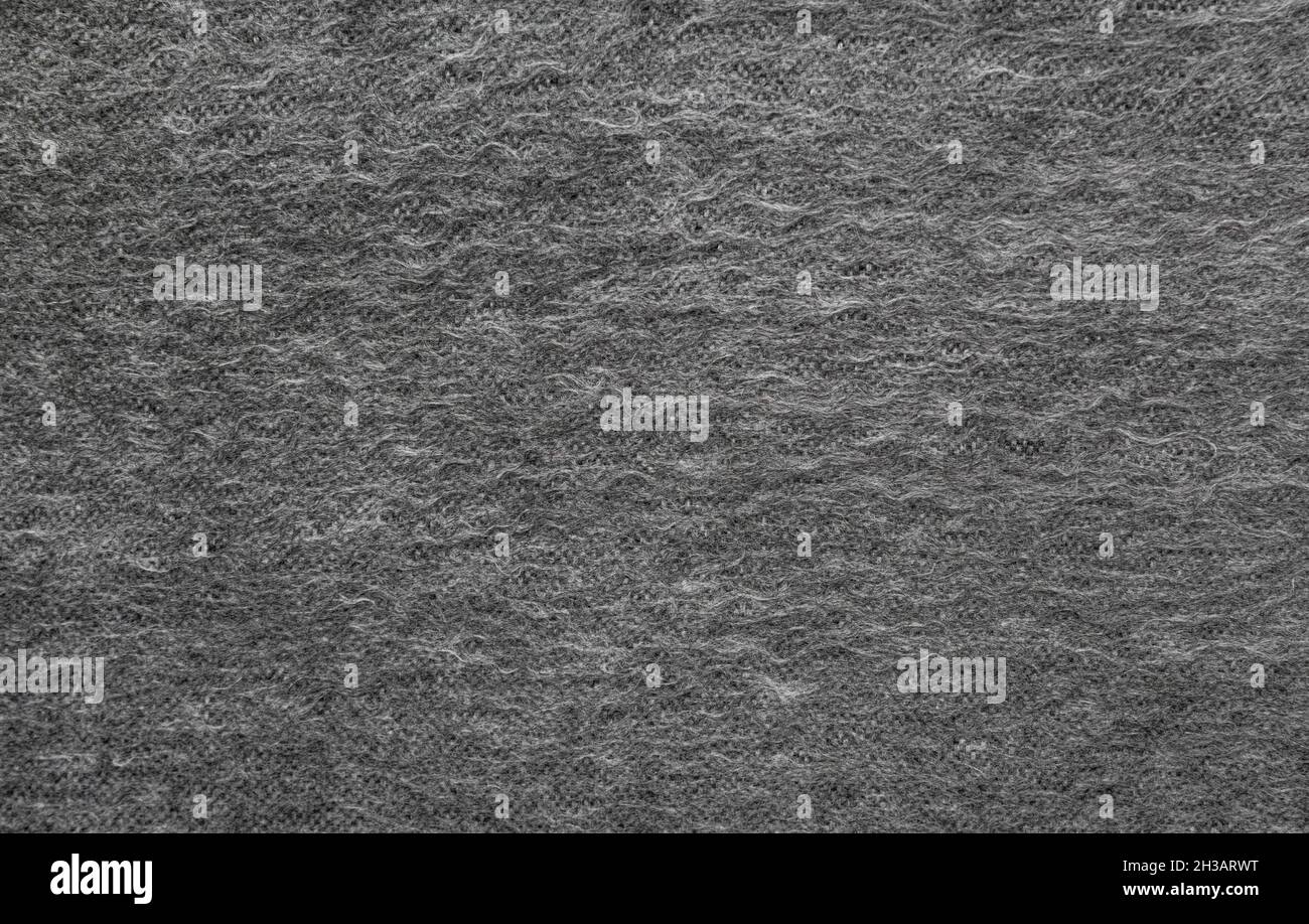 Texture of gray woolen fabric. Stock Photo