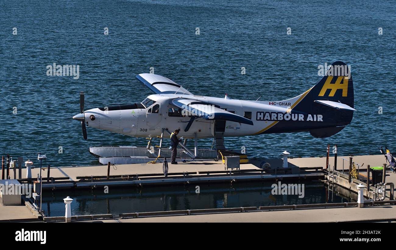 View of a de Havilland Canada DHC-3 Otter seaplane, operated by airline Harbour Air, mooring at Vancouver Harbour Flight Centre. Stock Photo