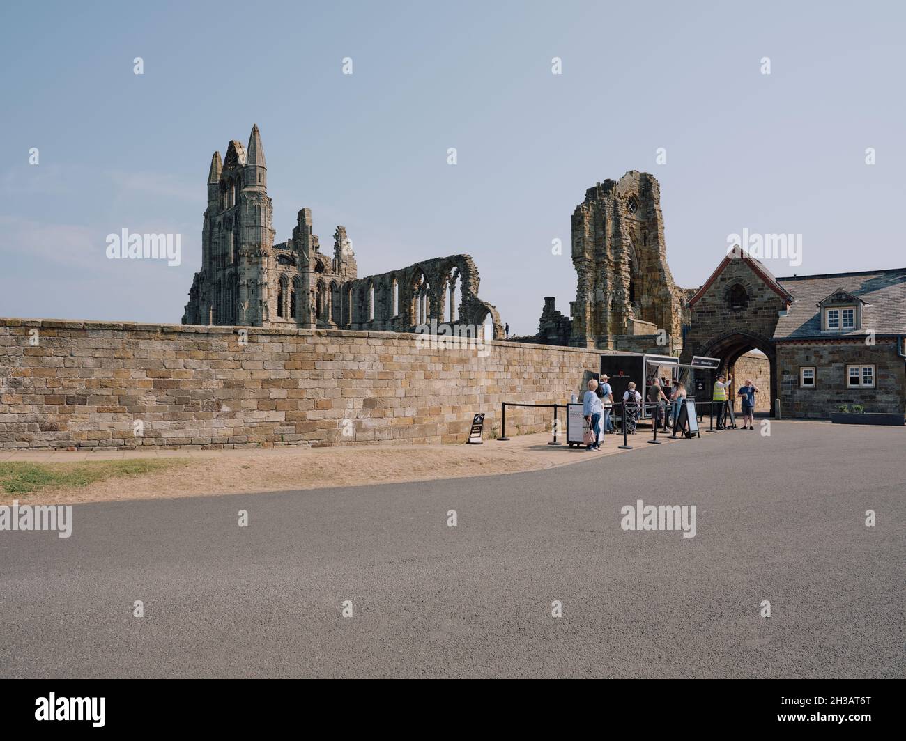 The entrance to the gothic ruins of Whitby Abbey a 7th-century Christian monastery that later became a Benedictine abbey managed by English Heritage Stock Photo