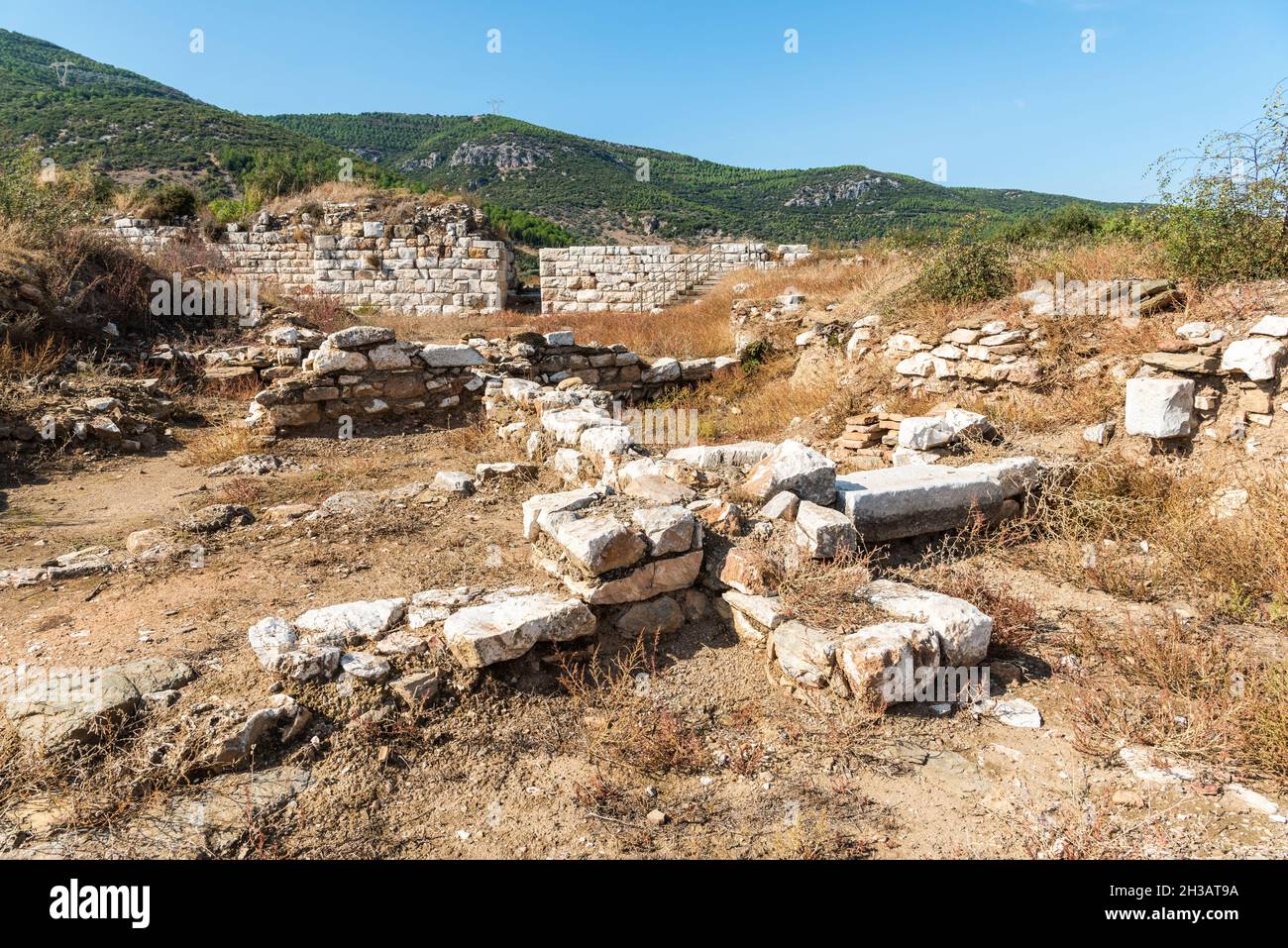 Ruins of the acropolis of Metropolis ancient site in Izmir province of Turkey. The fortification walls were built during the Hellenistic period. Metro Stock Photo