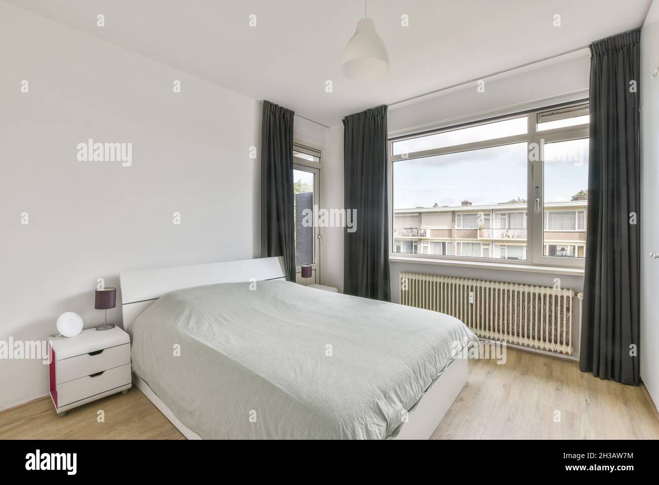 Luxury bedroom design with large size bed Stock Photo Alamy