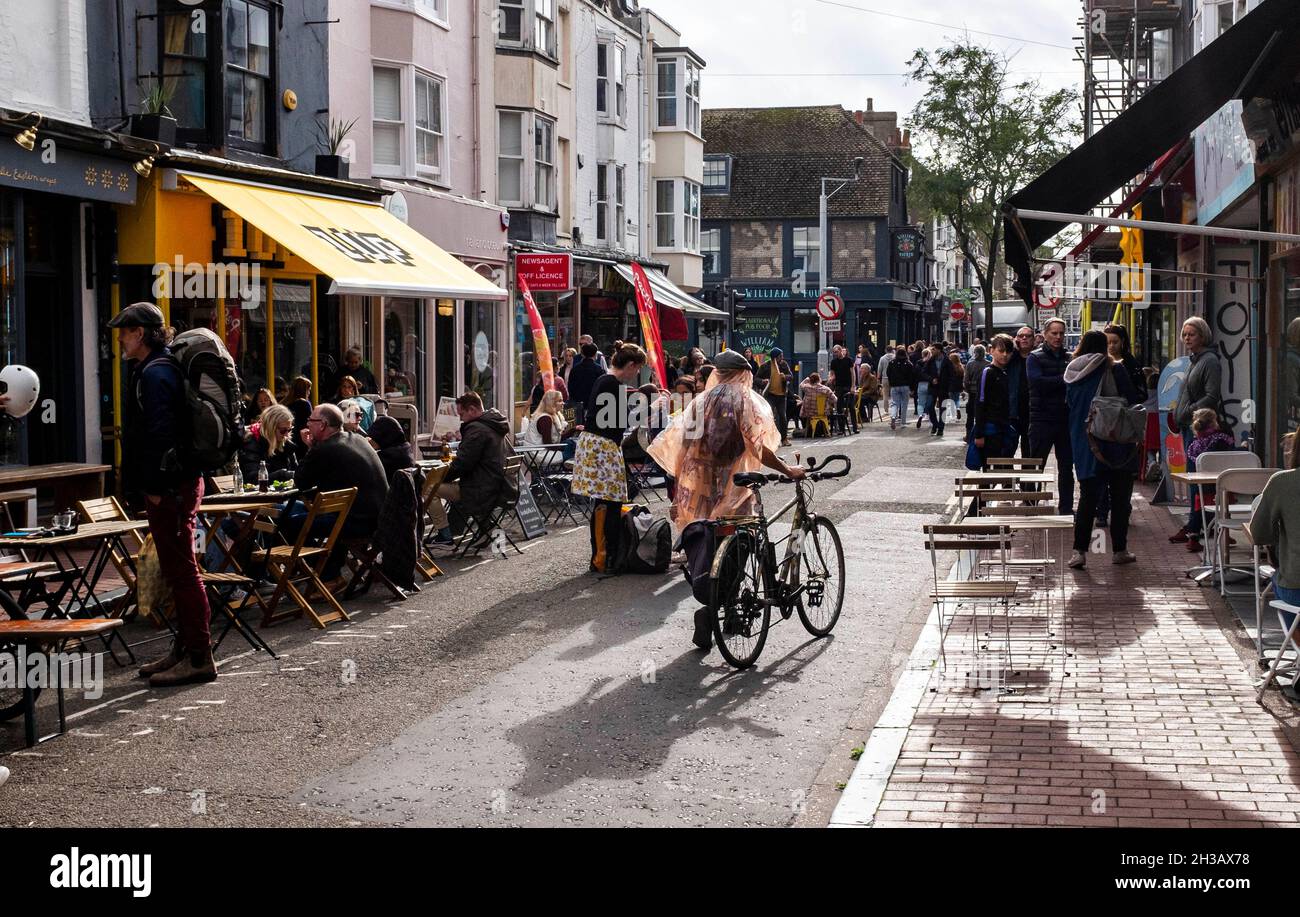 Brighton UK 27th October 2021 - The North Laine area of Brighton is busy  with shoppers during the schools half term week as the economy continues to  recover post lockdown in England :