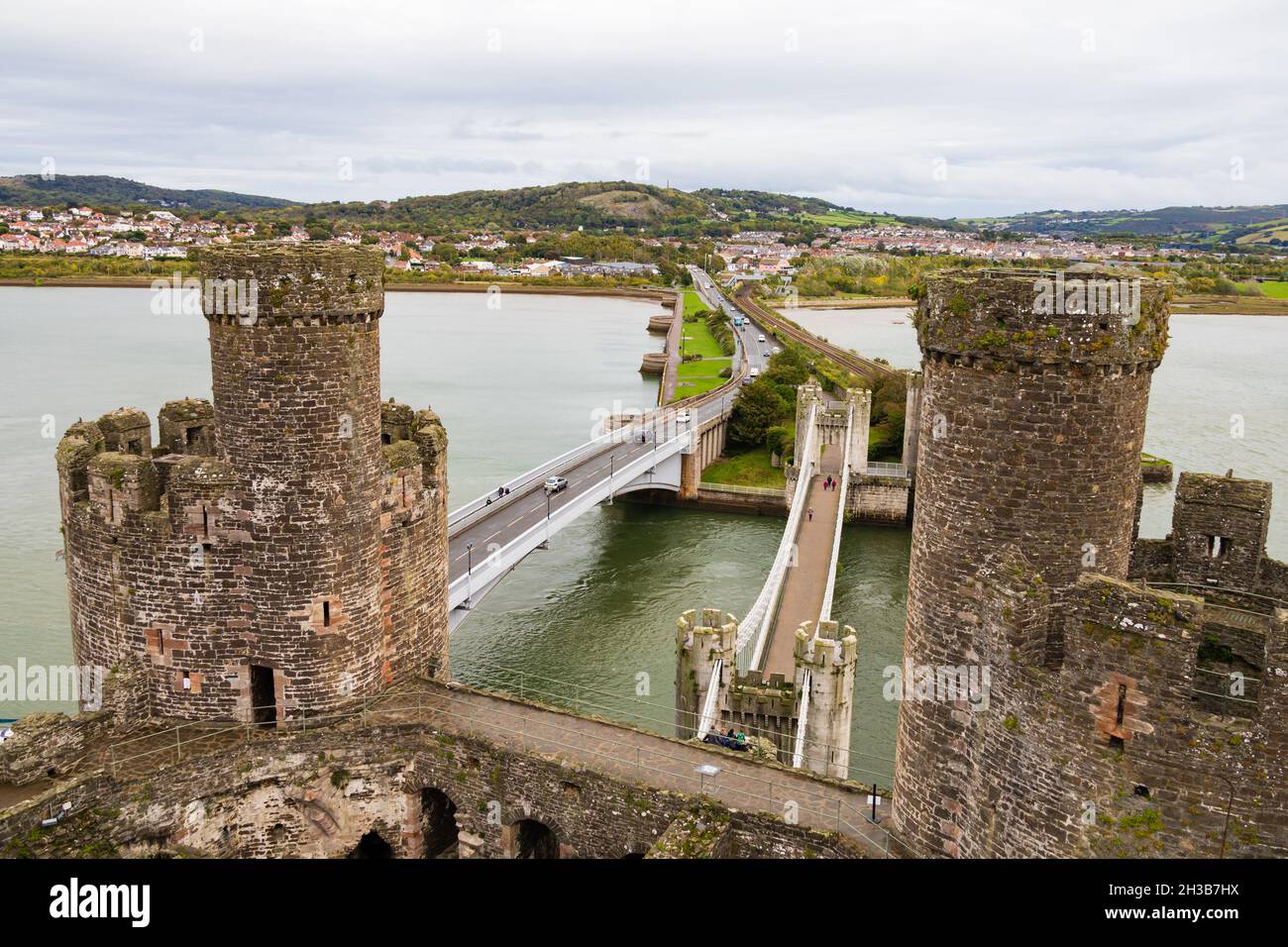 Conwy Castle, and Telford's suspension bridge over the River Conwy.  Conwy, Clwyd, Wales Stock Photo