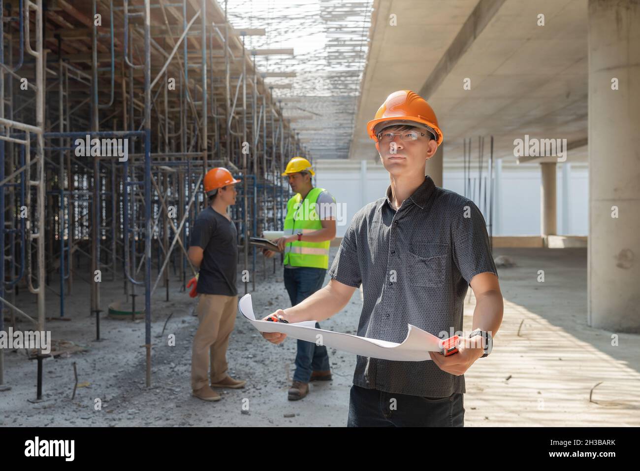 Architect, Engineer, Contractor, or Construction manager holding ...