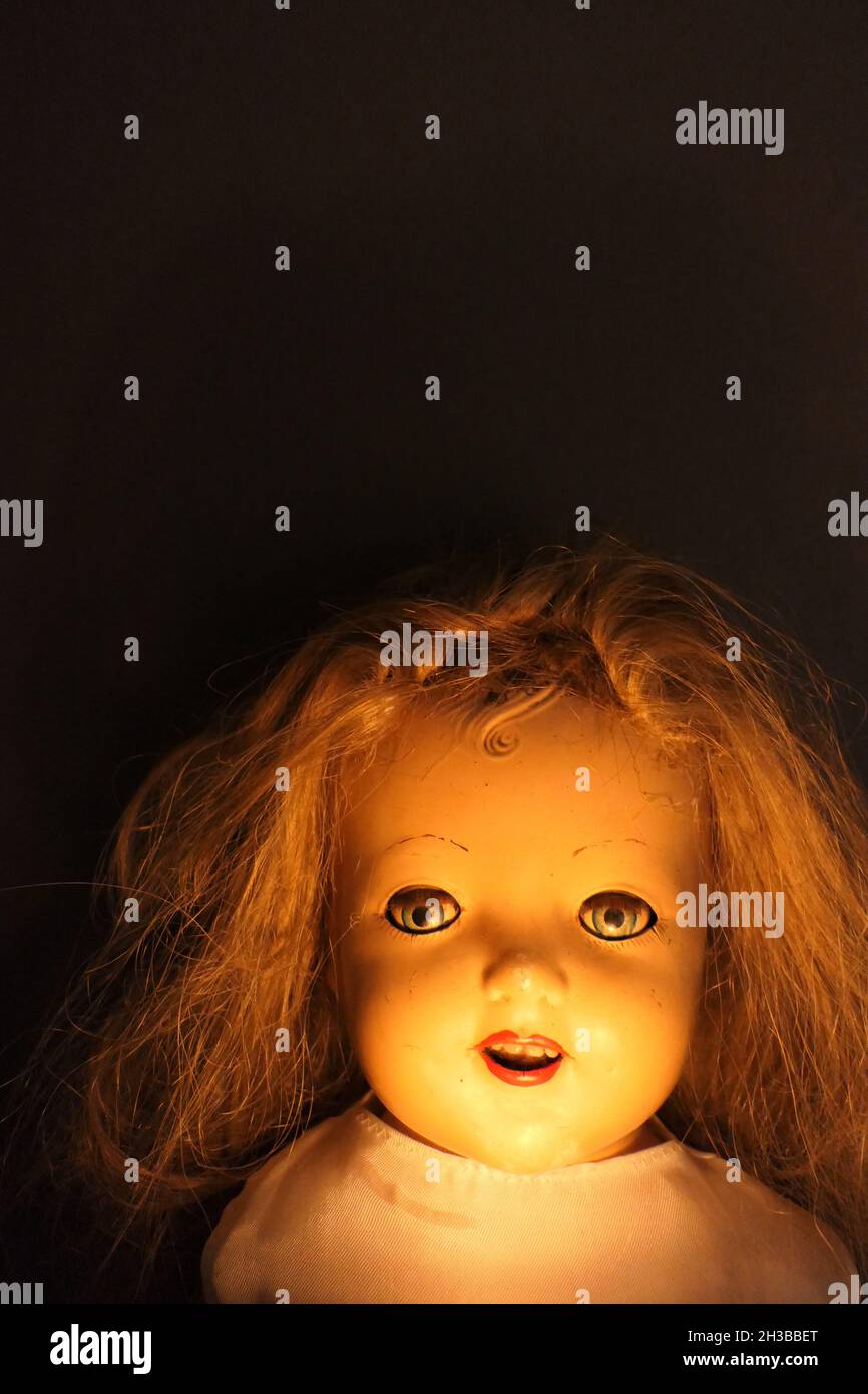 Creepy vintage doll halloween concept Stock Photo