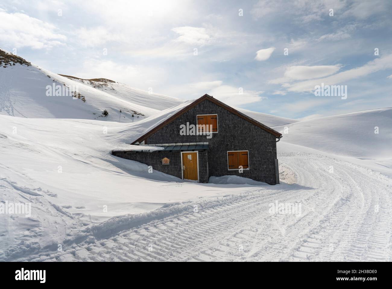 Mountain cabin covered with snow Stock Photo