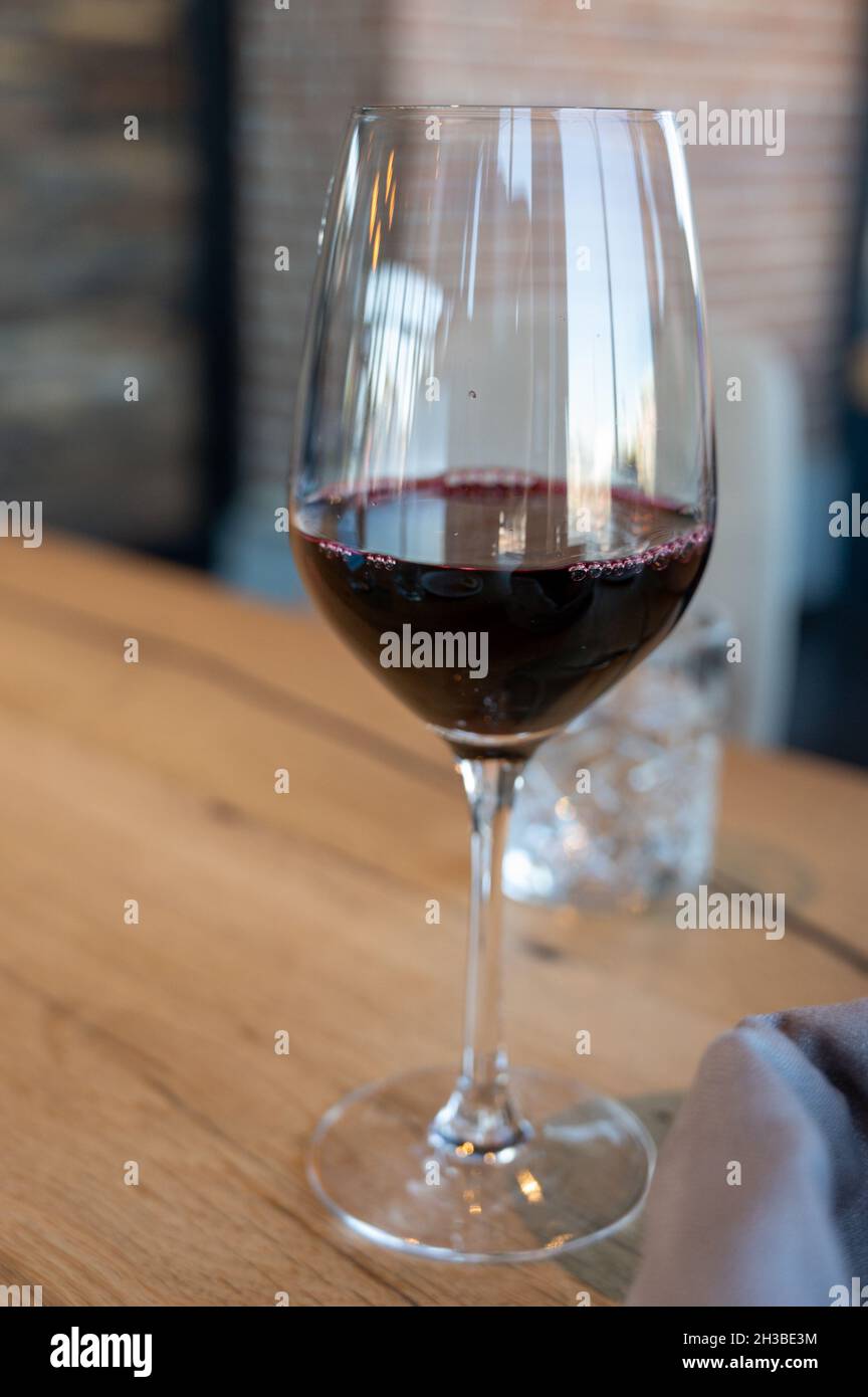 Glass of dry red wine served in cafe for lunch Stock Photo Alamy
