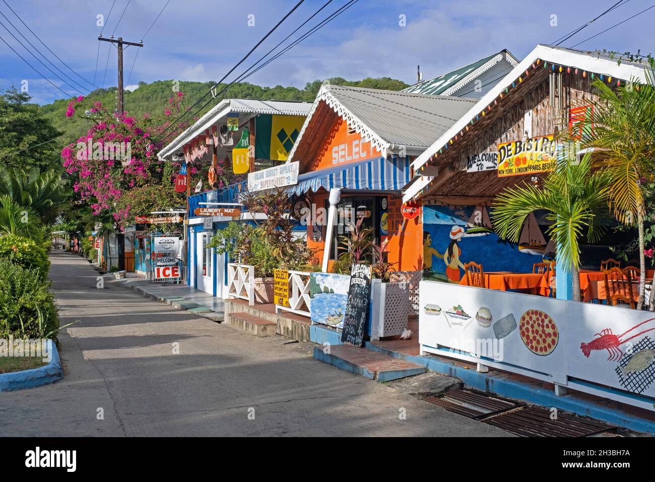 Main street with colourful shops and restaurants in capital town Port