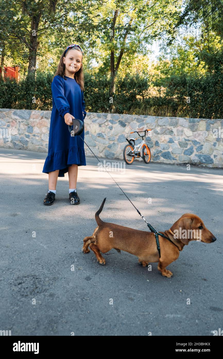 Teen Girl And Dogs Walking High Resolution Stock Photography and Images -  Alamy