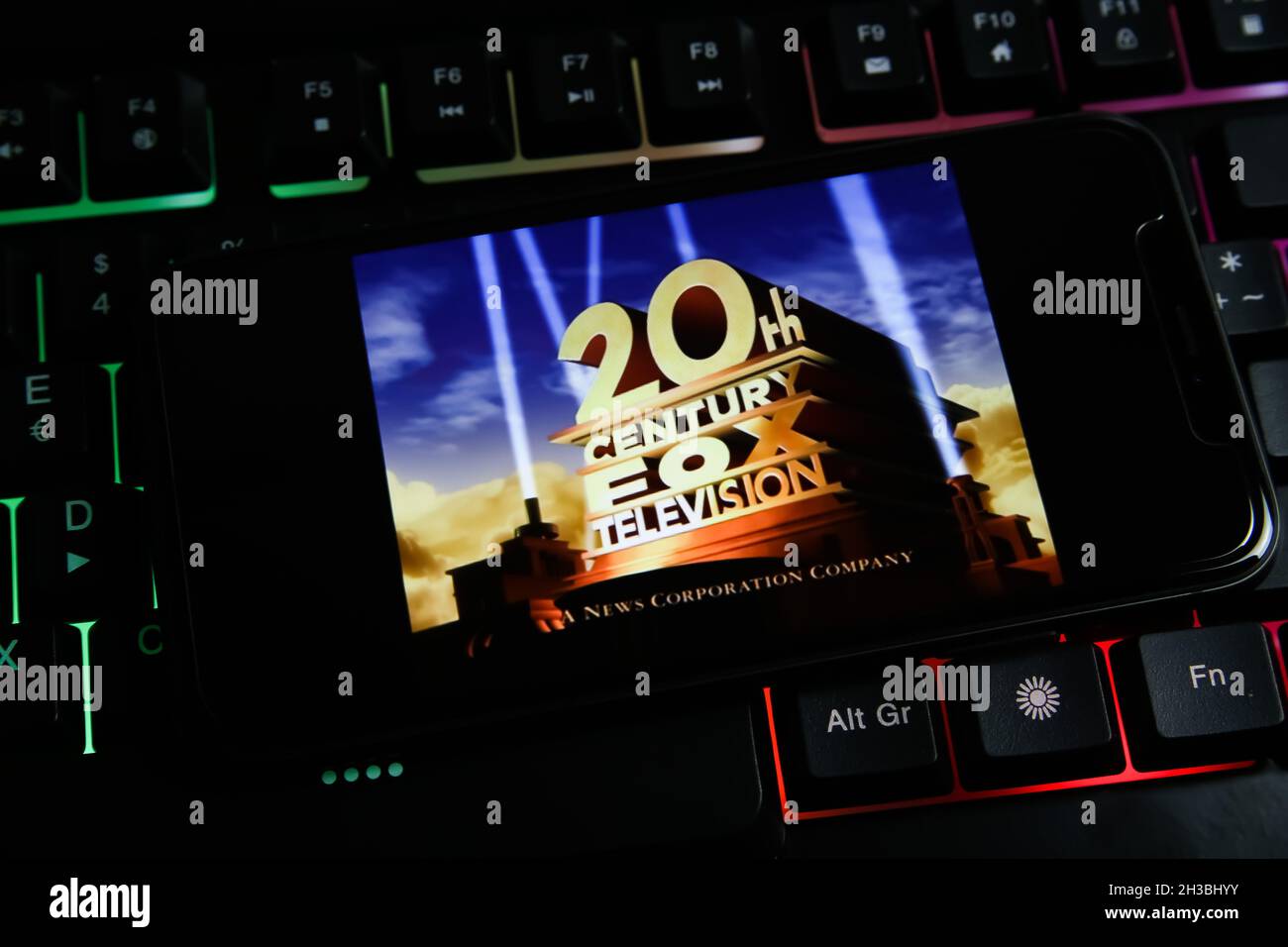 Viersen, Germany - June 9. 2021: Closeup of mobile phone screen with logo lettering of film production company 20th century fox television on computer Stock Photo