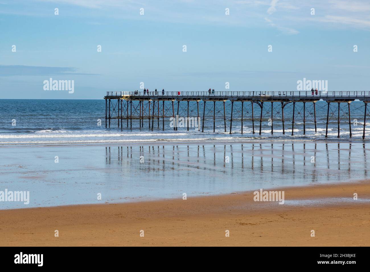 The Victorian Pier reflecting in the beach at lowtide, Saltburnbythe