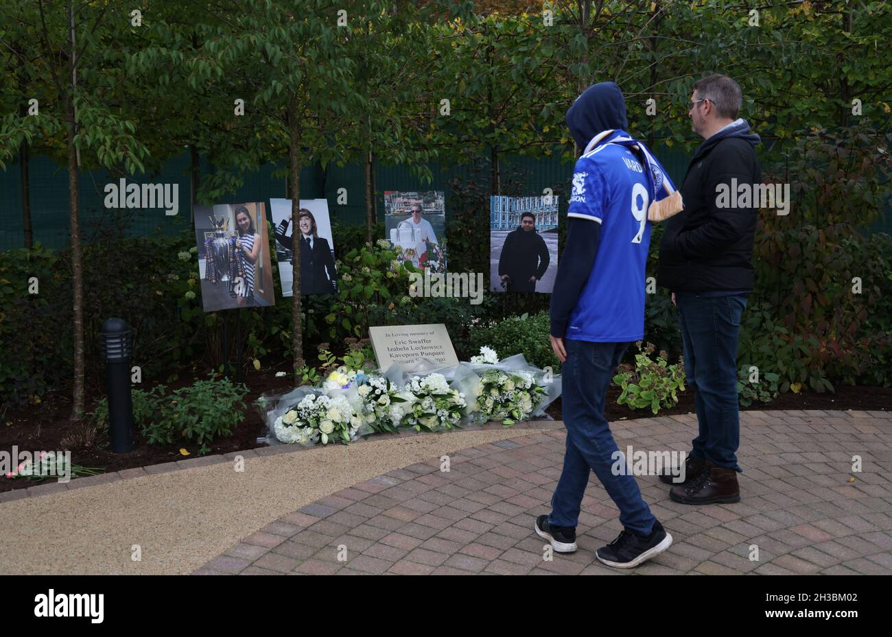Leicester, England, 27th October 2021.  Pictures of victims of the King Power Stadium helicopter crash stand in the Memorial Garden on the third anniversary before the Carabao Cup match at the King Power Stadium, Leicester. Picture credit should read: Darren Staples / Sportimage Stock Photo