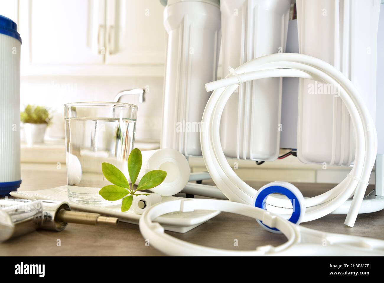 Equipment for mounting domestic reverse osmosis equipment on kitchen table. Front view. Horizontal composition. Stock Photo