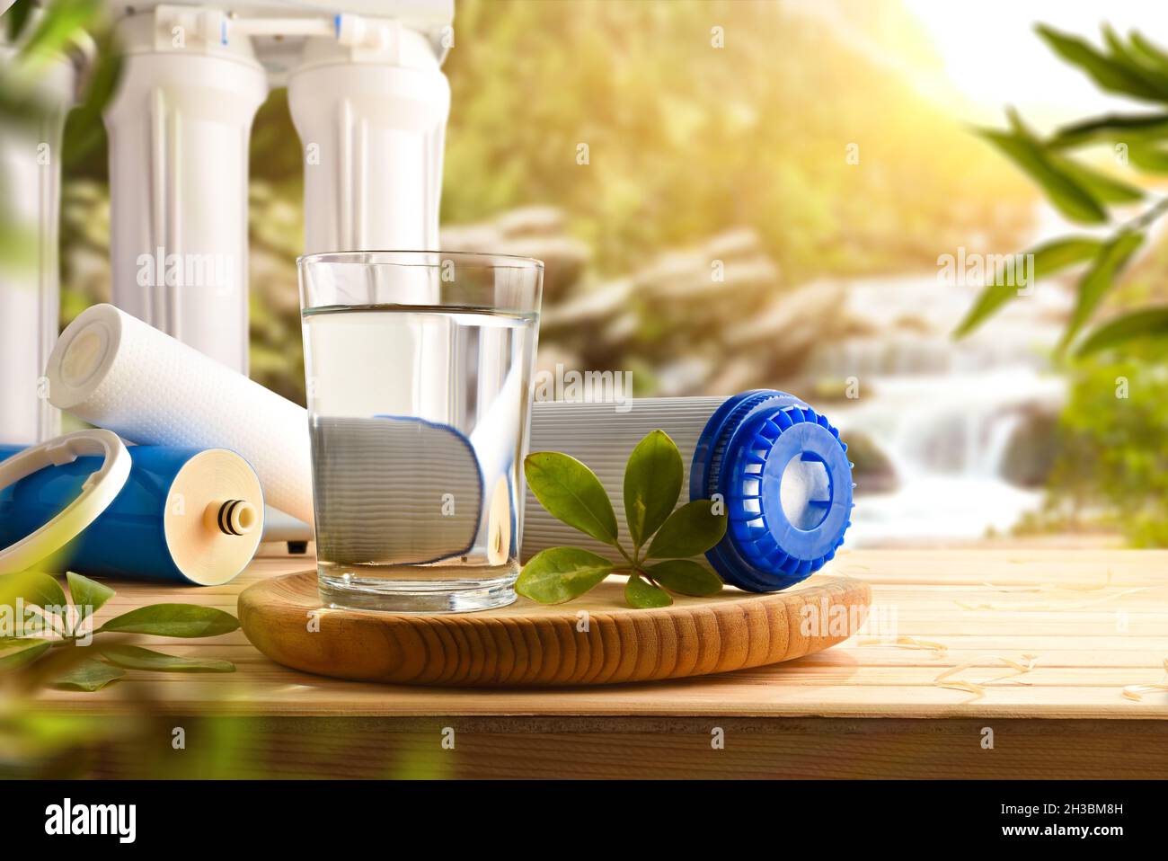 Glass of water purified by osmosis with environmentally friendly