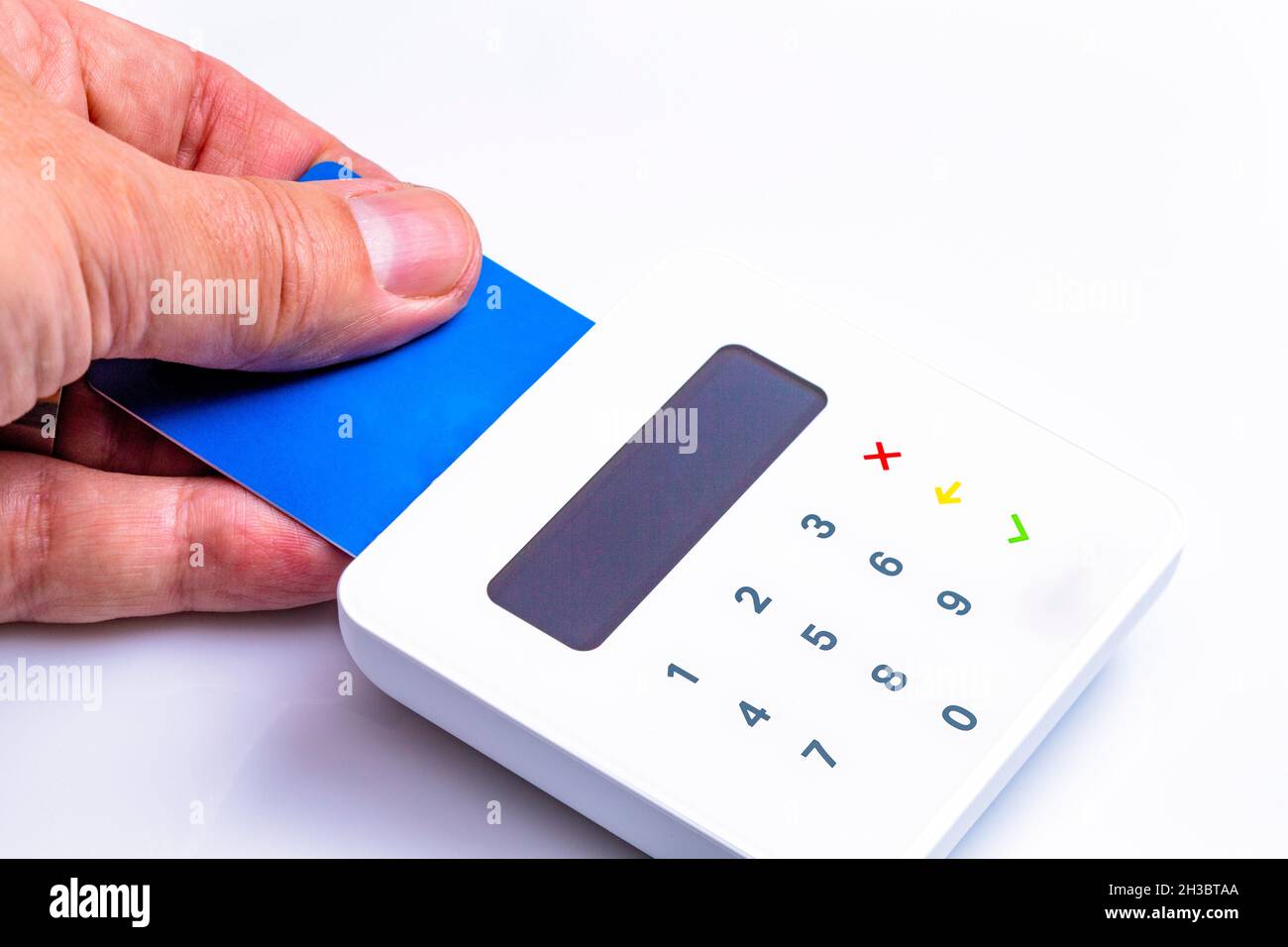 The photo shows a contactless payment transaction with EC card Stock Photo