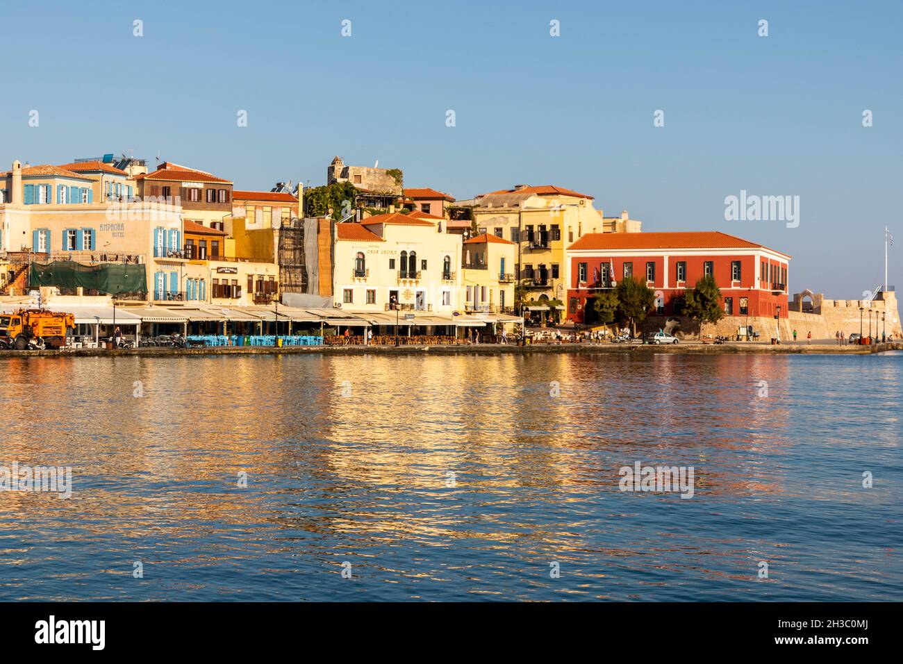 The old Venetian harbour in the late afternoon, Chania, Crete, Greece. Stock Photo