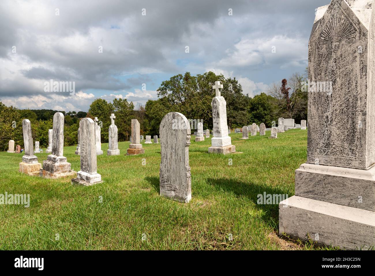Headstones marking the gravesites of people who were buried in the