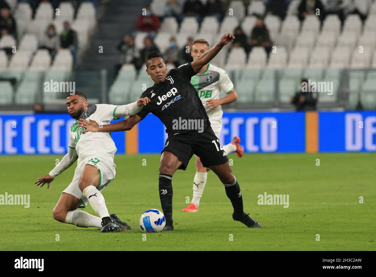 Turin, Italy. 27th Oct, 2021. Gregoire Defrel (US Sassuolo) vs Alex Sandro Lobo Silva (Juventus FC) during Juventus FC vs US Sassuolo, Italian soccer Serie A match in Turin, Italy, October 27 2021 Credit: Independent Photo Agency/Alamy Live News Stock Photo