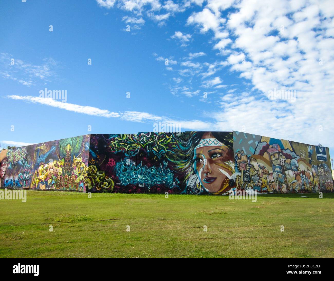 SYDNEY, AUSTRALIA - Sep 16, 2021: A Grafitti Artist Spraypaints Wall in Sydney Uni's Public Grafitti Tunnel, Sydney, Australia Stock Photo