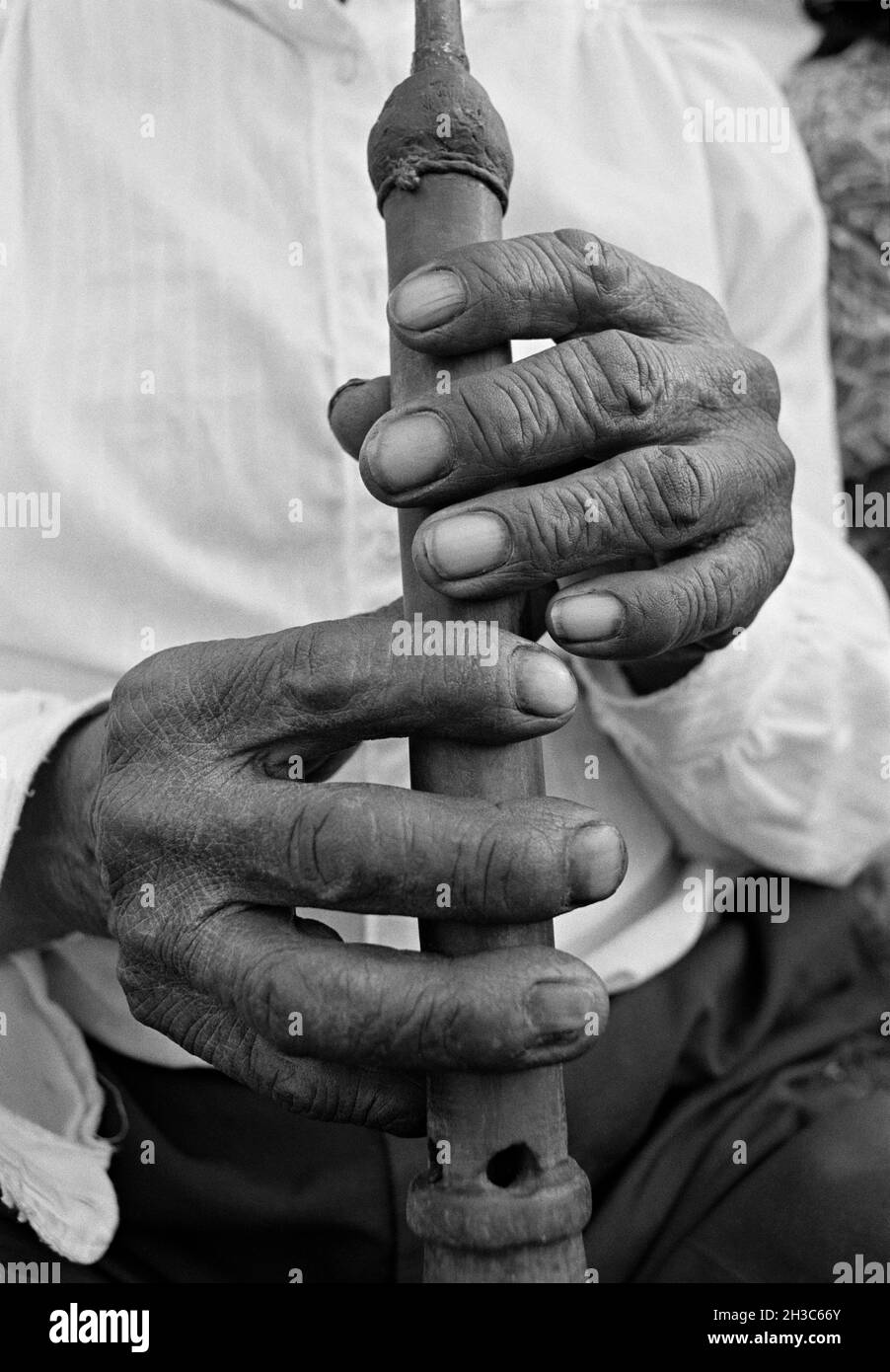 A Guatemalan flute player's hands (flute is called a 'chirimigh