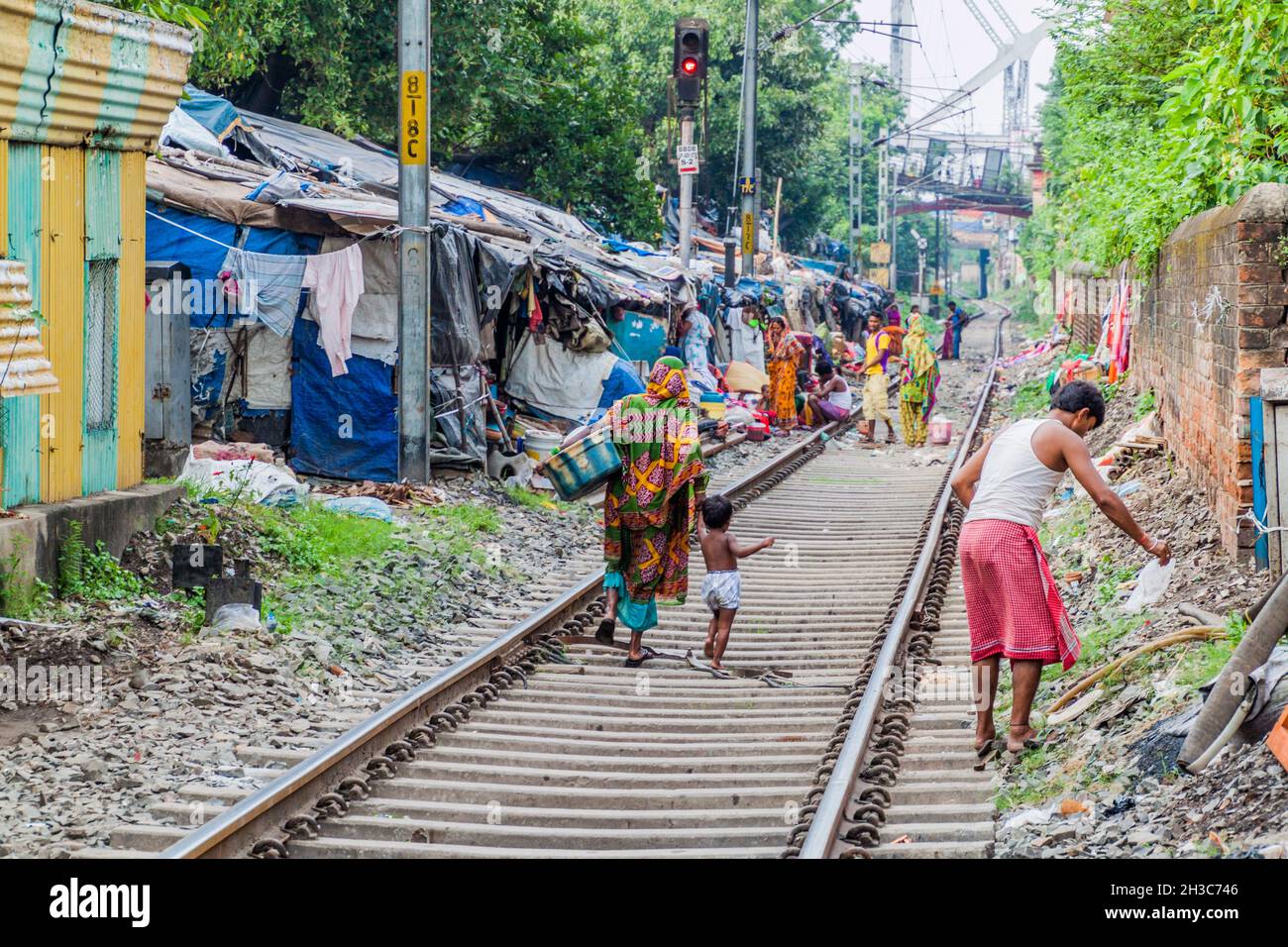 KOLKATA, INDIA - OCTOBER 31, 2016: Railway track and a slum in the center of Kolkata, India Stock Photo