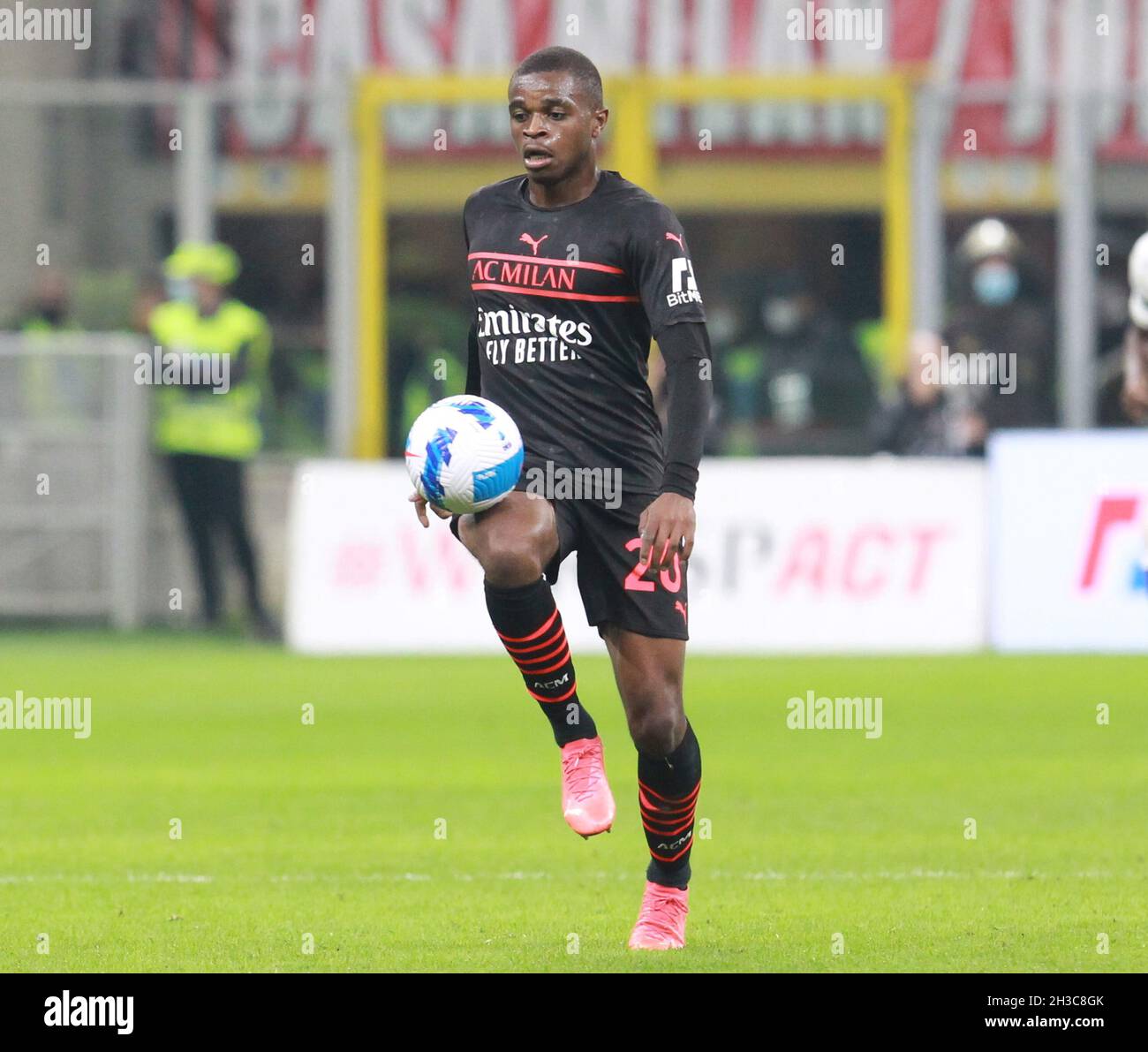 MILAN ITALY- October 26 Stadio G Meazza  Pierre Kalulu  / Defender in acton during the Serie A match between Ac Milan and Fc Torino  at Stadio G. Meazza on October 26, 2021 in Milan, Italy. Stock Photo