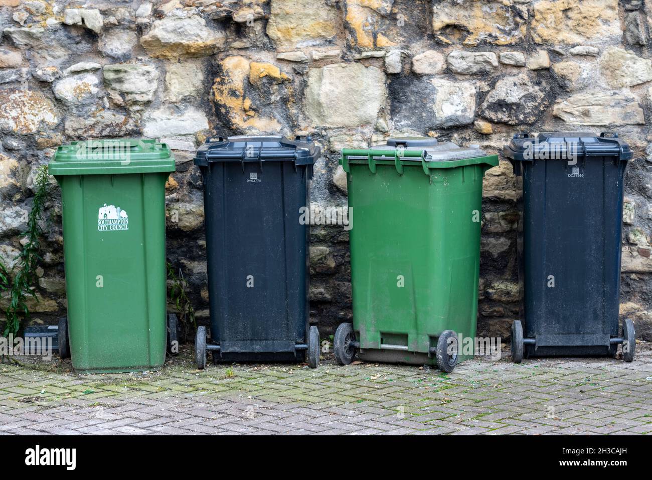 wheelie bins in a row, line of wheelie bins, rubbish bins, waste