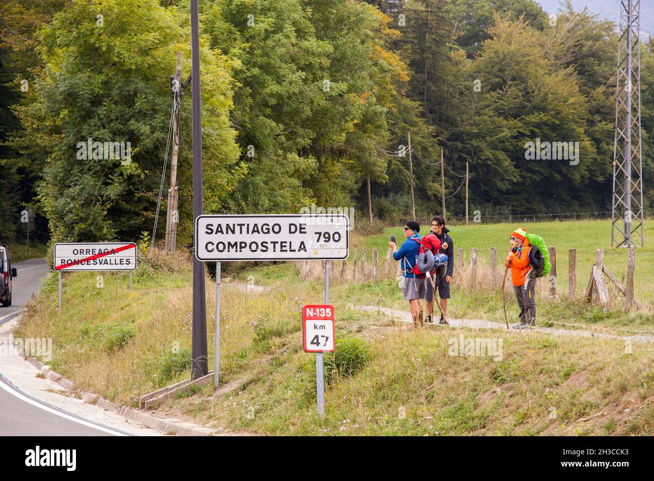 Pilgrims in Roncesvalles at the start of the Camino de Santiago the way of St James walking to Santiago de Compostela the Spanish pilgrimage route Stock Photo