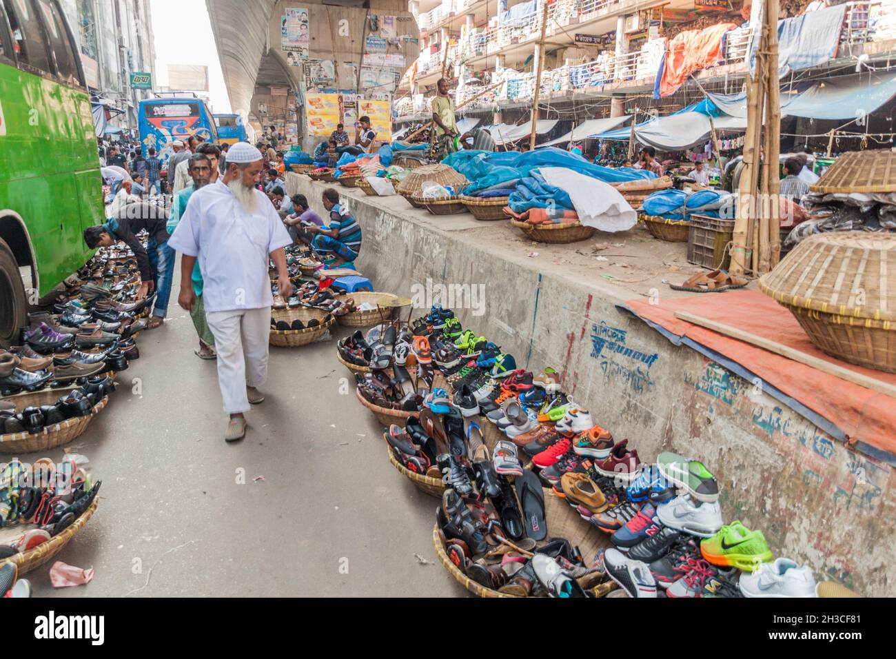 DHAKA, BANGLADESH NOVEMBER 21, 2016 Shoe sellers with their