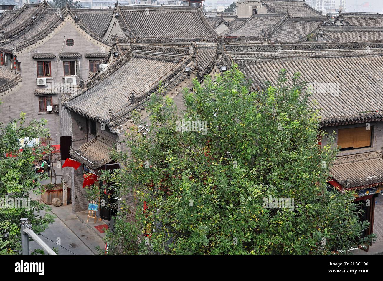 Inclined roofs-houses beside the City Wall-Yongning South Gate area. Xi'an-China-1595 Stock Photo