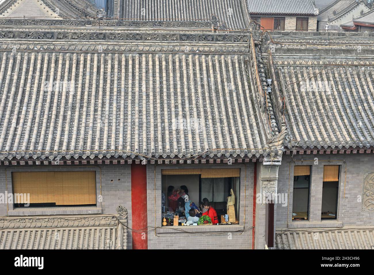 Inclined roofs-houses beside the City Wall-Yongning South Gate area. Xi'an-China-1596 Stock Photo