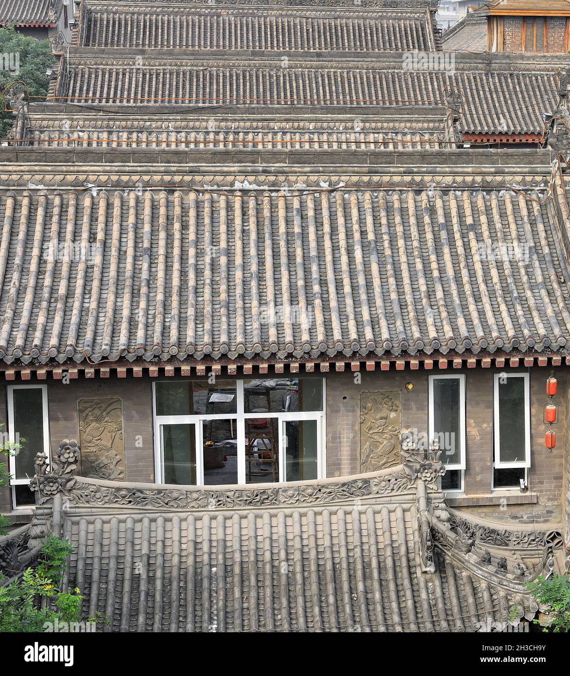 Inclined roofs-houses beside the City Wall-Yongning South Gate area. Xi'an-China-1597 Stock Photo