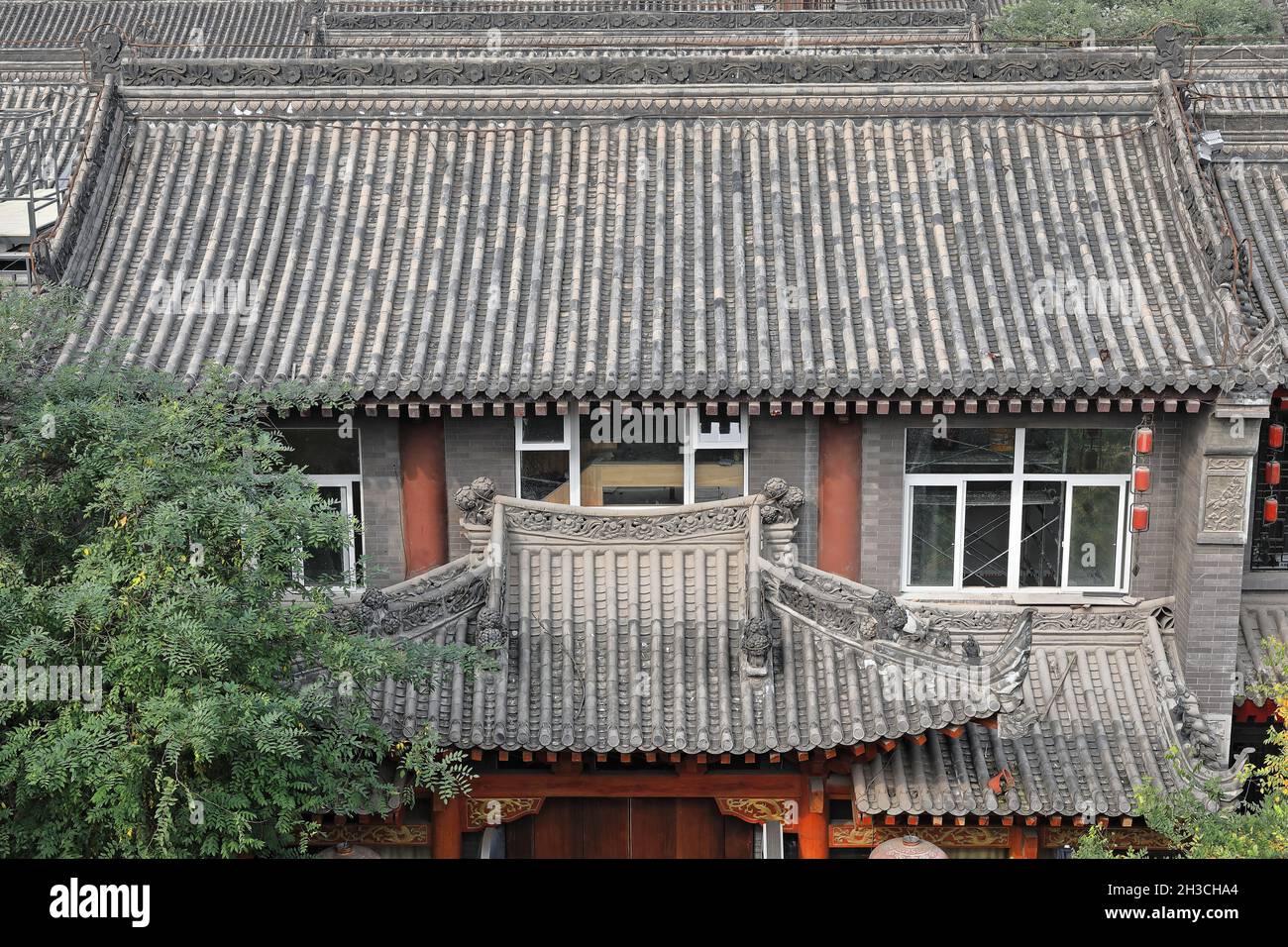 Inclined roofs-houses beside the City Wall-Yongning South Gate area. Xi'an-China-1598 Stock Photo