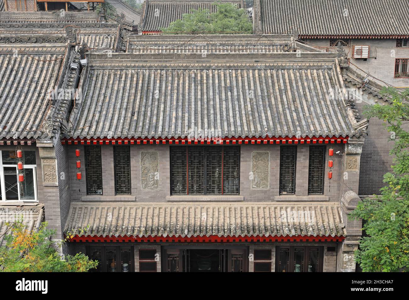 Inclined roofs-houses beside the City Wall-Yongning South Gate area. Xi'an-China-1599 Stock Photo