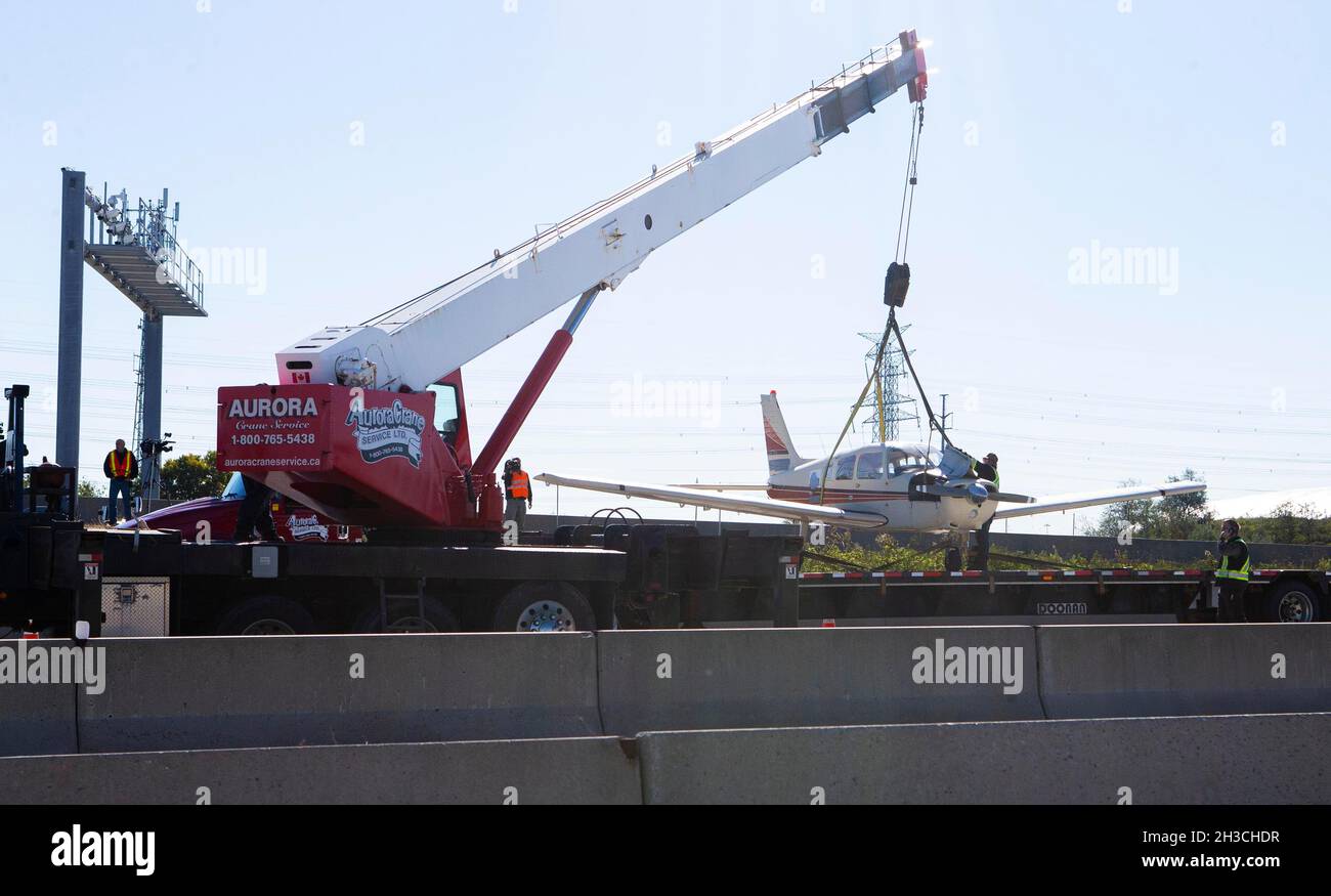 Markham, Canada. 27th Oct, 2021. Rescuers use a crane to lift a small