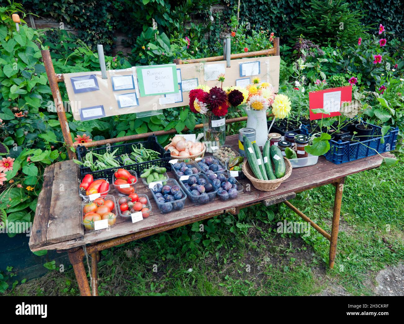 A variety of  kitchen garden produce on sale outside a cottage in the village of Wickhambreaux, Kent, UK Stock Photo