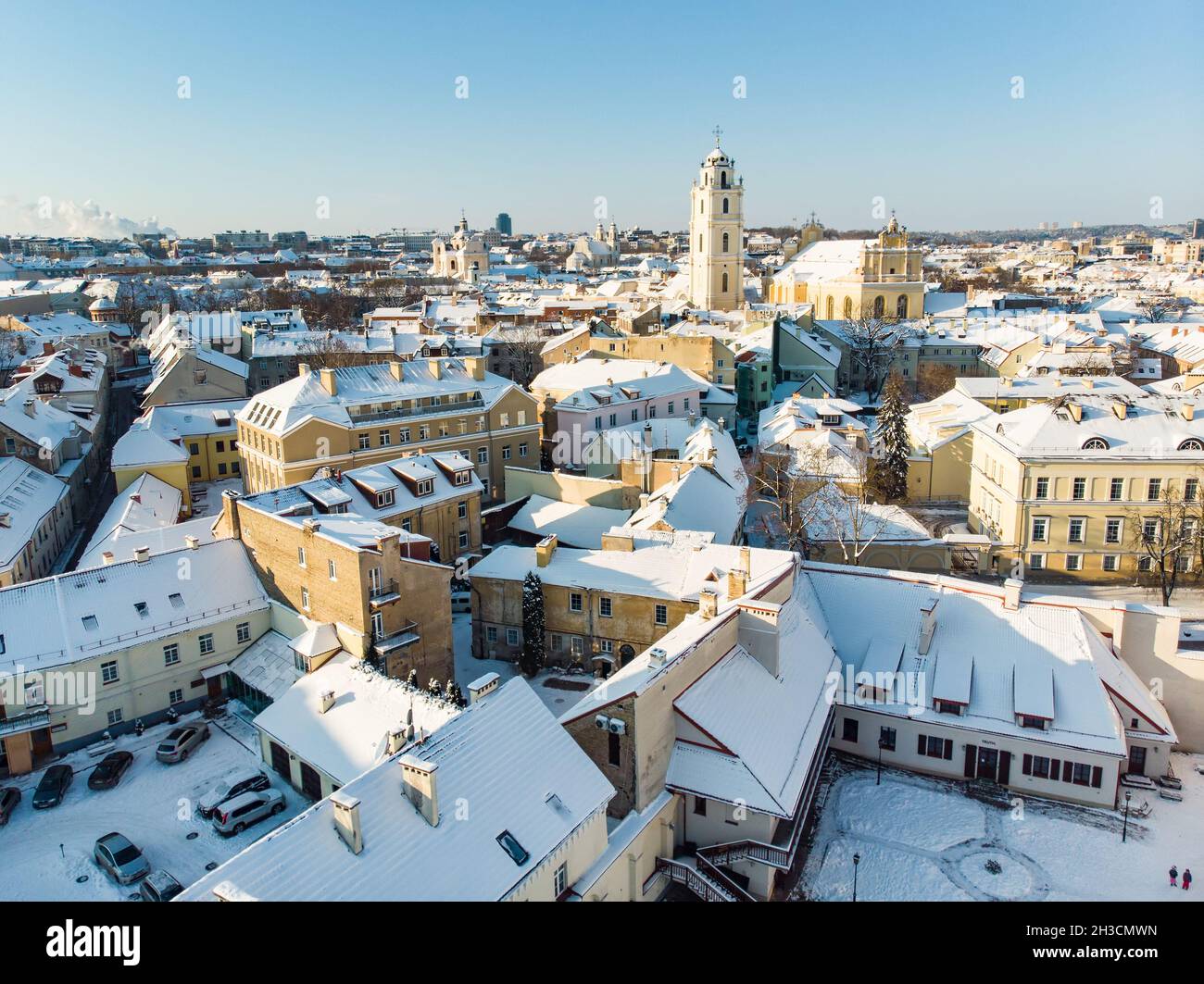 Beautiful Vilnius city panorama in winter with snow covered houses ...