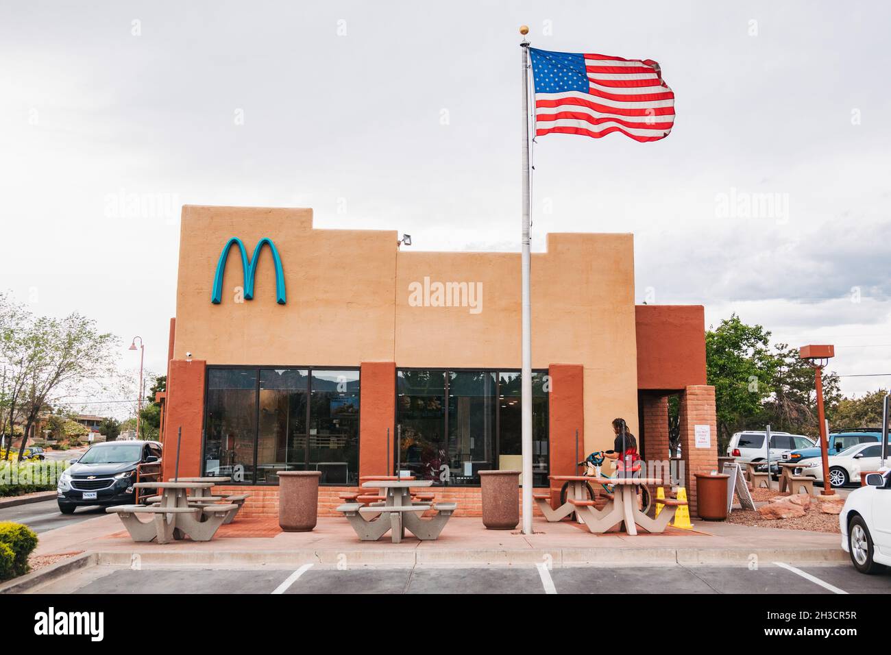 a McDonald's with 'blue arches' in Sedona, AZ. Local regulations on building colors meant swapping the usual golden yellow for turquoise blue Stock Photo