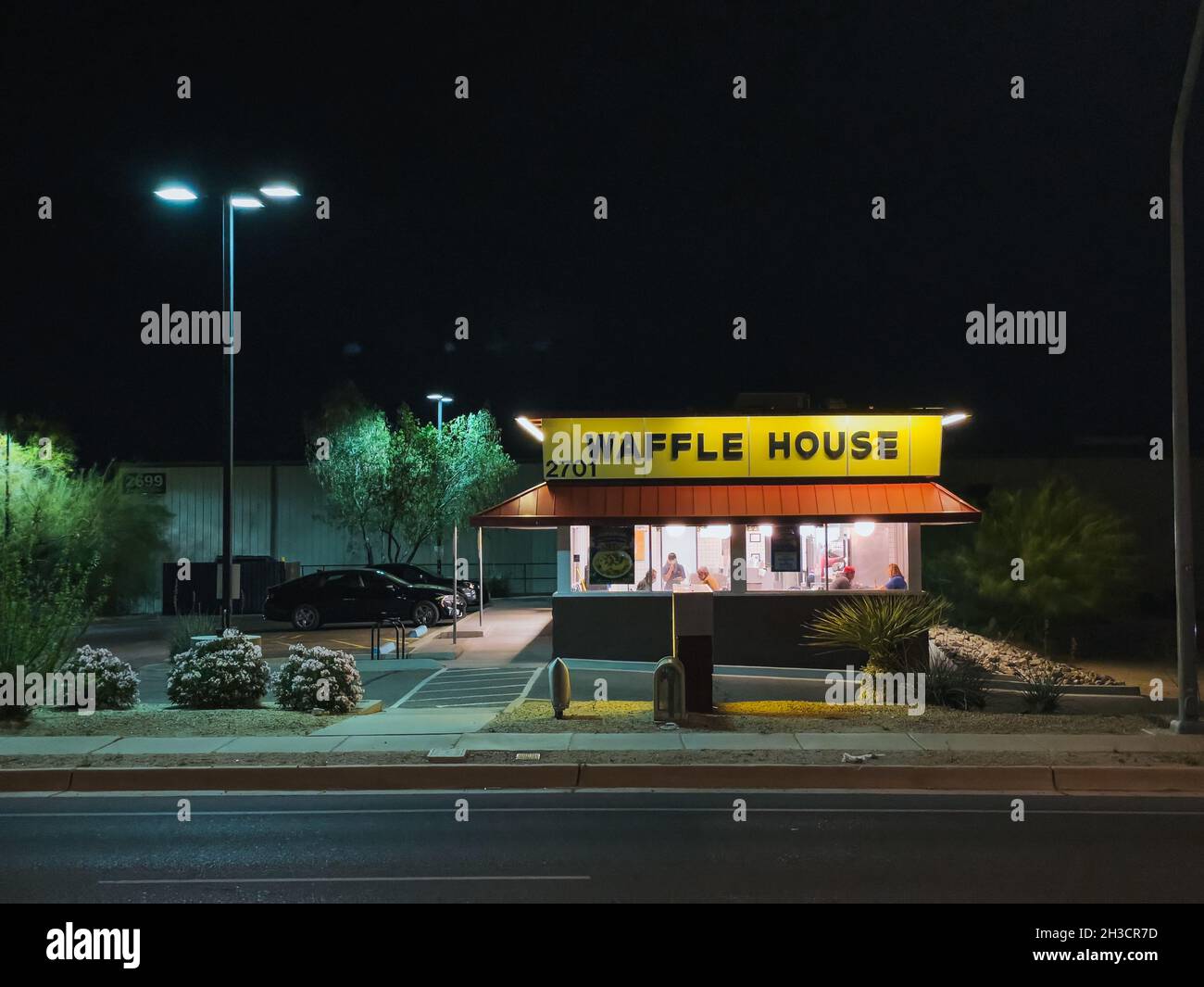 a Waffle House restaurant at night in Tucson, Arizona, United States of America Stock Photo