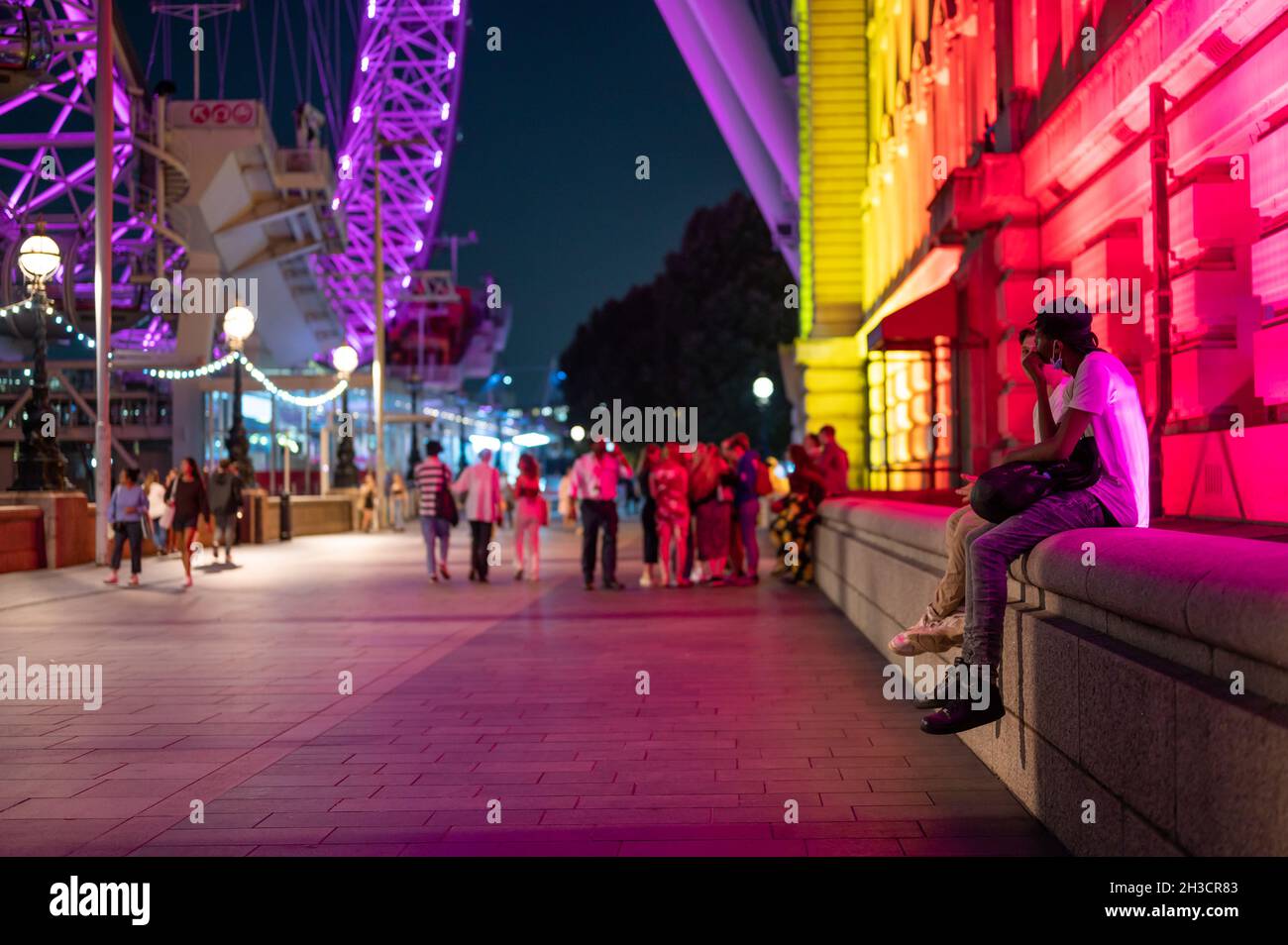 LONDON SEPTEMBER 14, 2021 Colourfully lit night time scene on The