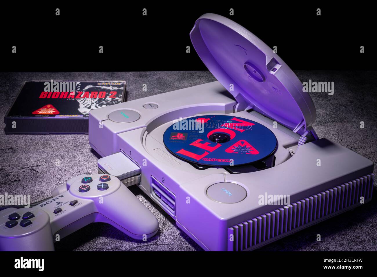 Fukuoka, Japan - october 27, 2021 : Biohazard 2 disk in a sony playstation console Stock Photo