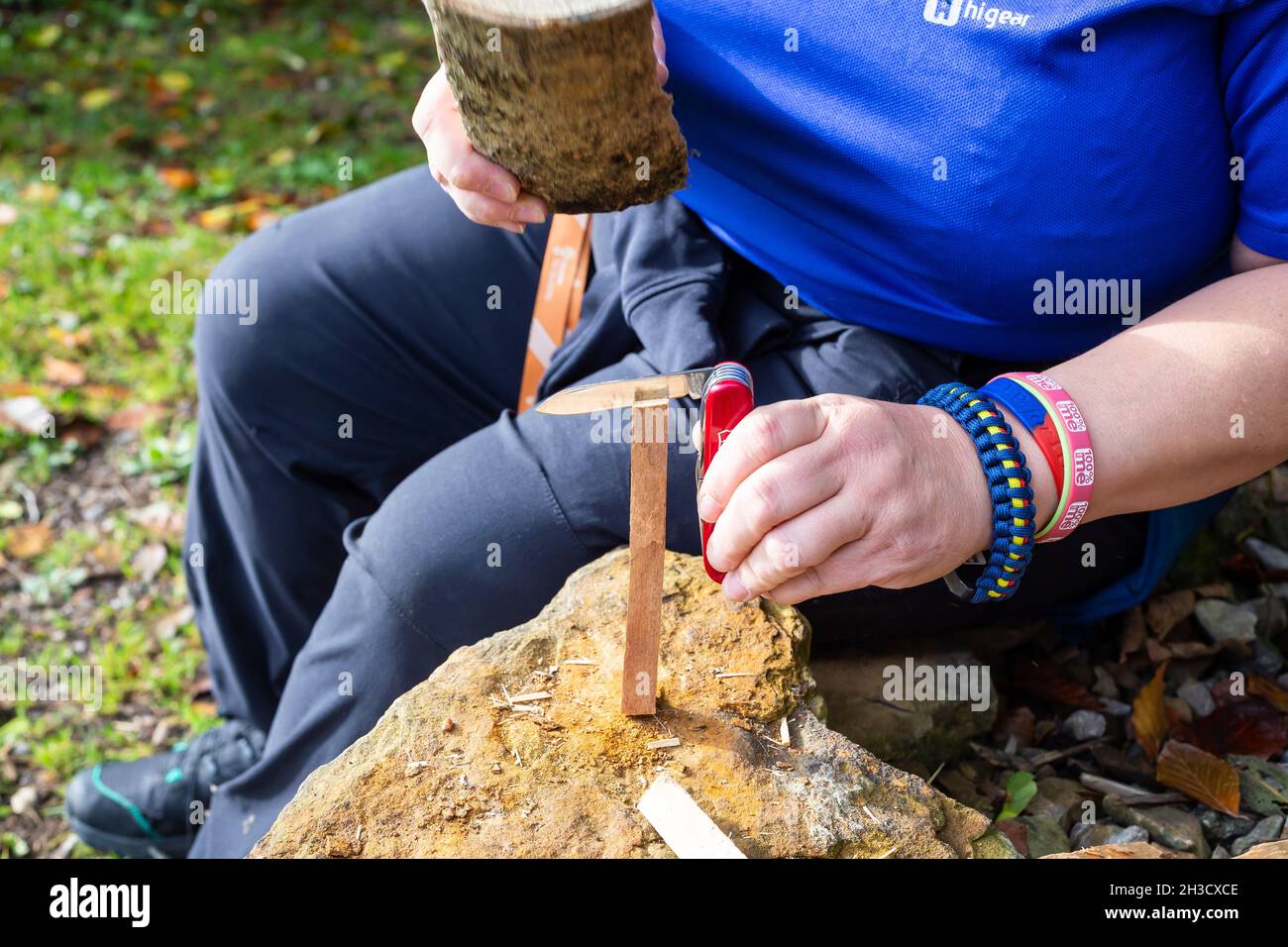 Camping, Survival skills, Fire, cooking, orienteering, ropes knots, making kindling Stock Photo