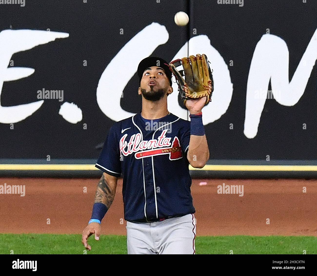 Houston, USA. 27th Oct, 2021. Atlanta Braves left fielder Eddie Rosario  catches a long fly ball from Houston Astros Yuli Gurriel in the 4th inning  in game two in the MLB World