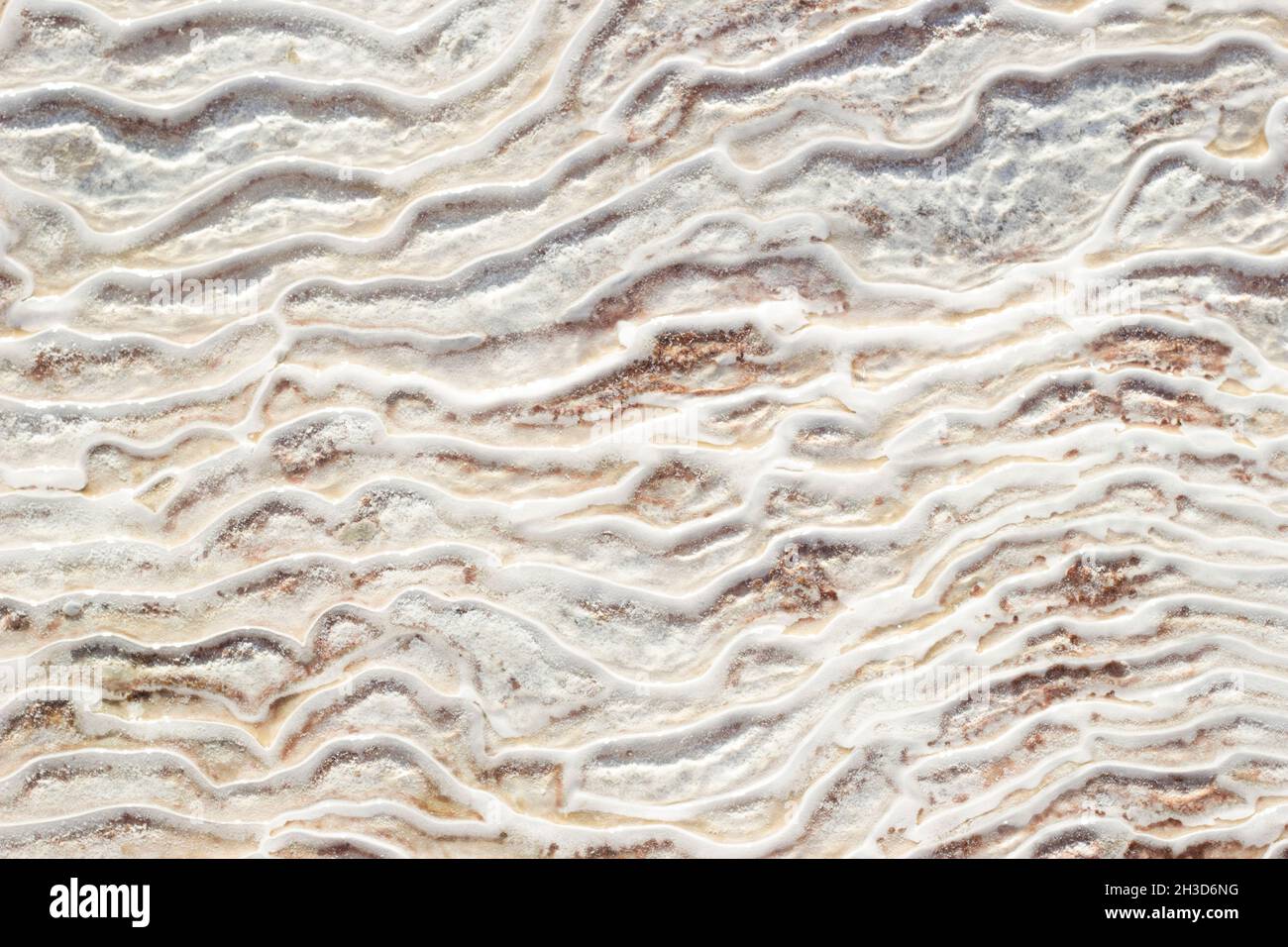 Background textural of asymmetric drawing. Natural texture of travertine Pamukkale. Close-up Stock Photo