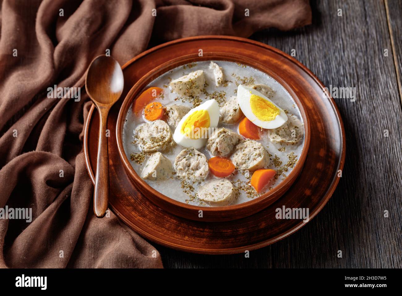 Zurek polish fermented rye soup with traditional polish white kielbasa