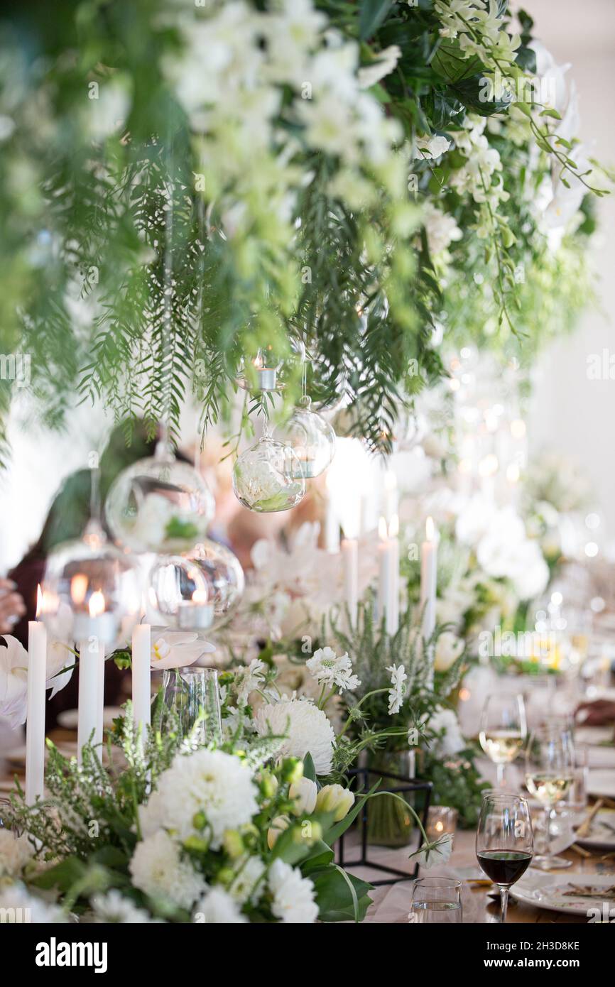 Modern and fresh floral decorations at a wedding reception, The Lake