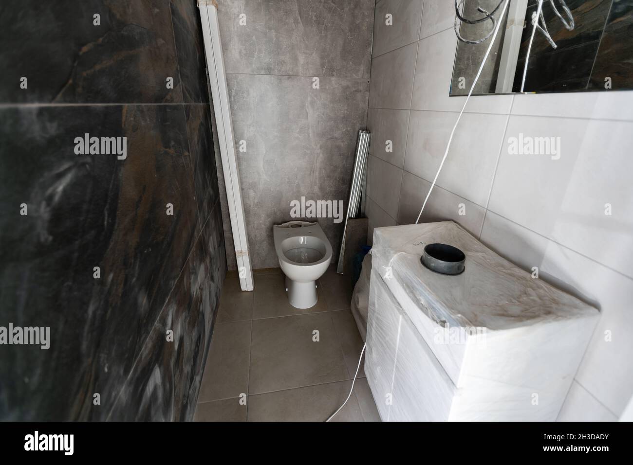 bathroom renovation removing tiles in apartment bathroom Stock Photo Alamy