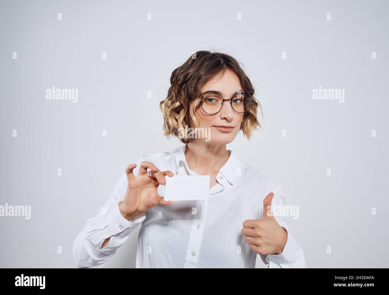 Business woman in white shirt documents secretary work Stock Photo - Alamy