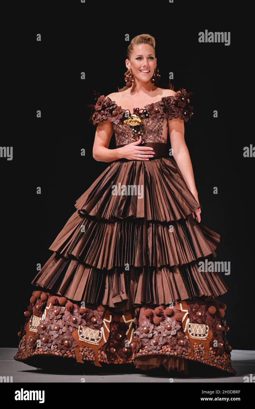 Sandy Heribert walks the runway during the opening night of the 'Salon du  Chocolat - Paris 2021' - wearing Hugues Pouget, Pastry Chef of Hugo &  Victor creation and Ricardo Davila for